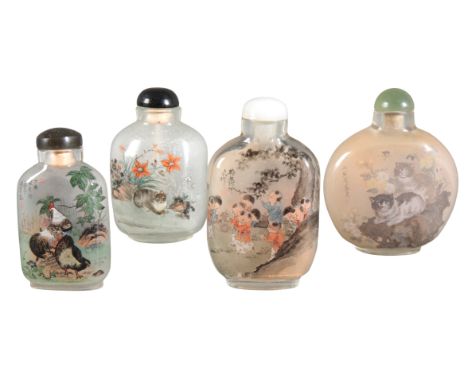 A GROUP OF FOUR CHINESE INSIDE PAINTED GLASS SNUFF BOTTLES 20th century, three bearing inscriptions and seal marks, 8.5cm, 8c
