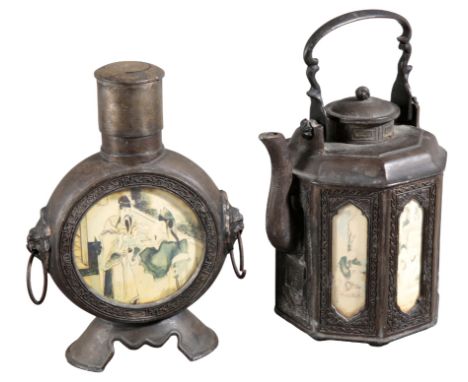A CHINESE METAL TEAPOTmarked to the base, 20th century, of octagonal section, with decorative panels to each side; 16cm high;