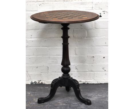 Victorian walnut tripod table, chequer board top, height 67cms.