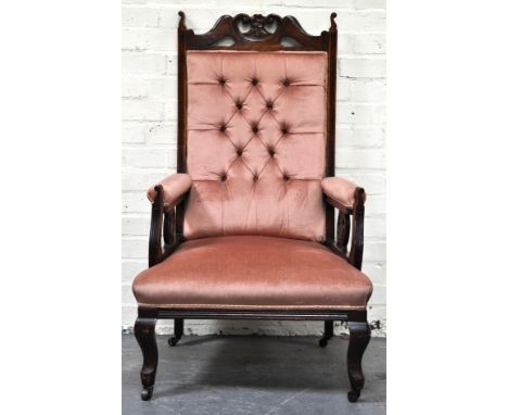 Oak framed grandfather chair, salmon button-back upholstery, cabriole legs.
