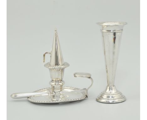 Hallmarked silver spill vase, Birmingham 1904, and an electroplated chamber stick (2).