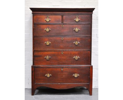 George III oak chest on stand, two short and four long drawers, bracket feet, height 135cms, width 95cms, depth 52cms.