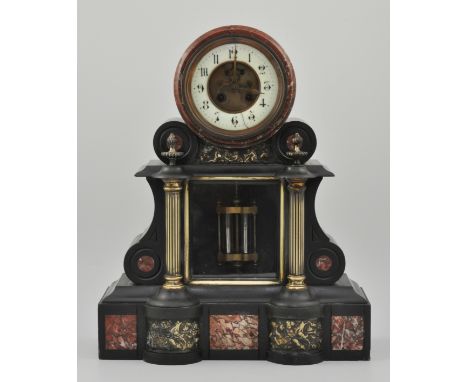 Black slate and red marble two train mantel clock, striking on a bell, the 12cms cream chapter ring enclosing a recessed visi