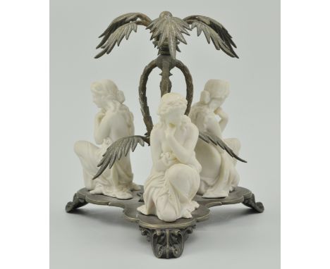 Victorian electroplated centre piece, raised from a trefoil base, with three scrolled feet, under a scrolled decorated tripod