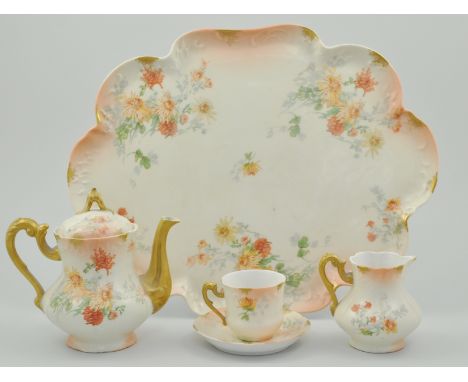 French porcelain part cabaret set, peach and floral decoration, comprising of a teapot, milk jug, sugar bowl, tray, three sau