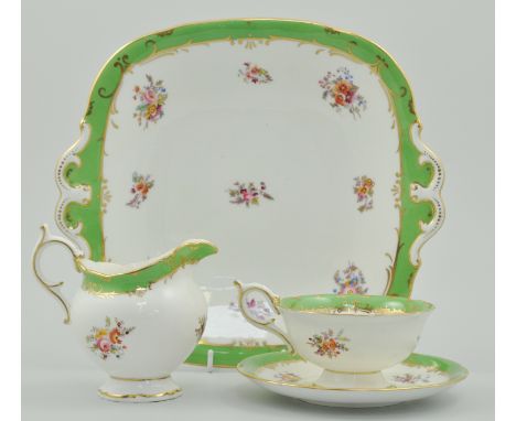 Coalport part tea service, green band and floral hand painted decoration, comprising of twelve cups, twelve saucers, milk jug