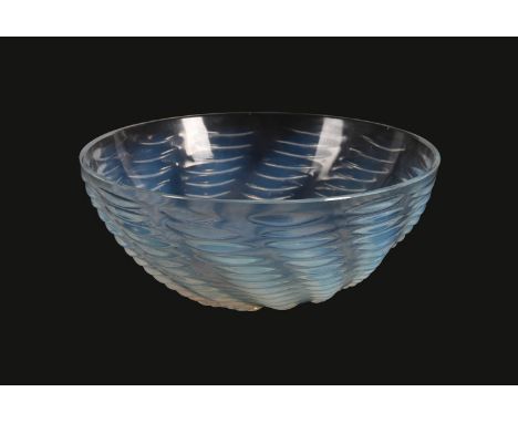 LALIQUE, RENÉ LALIQUE, ONDES, AN OPALESCENT GLASS BOWL  DESIGNED 1931 Moulded with ribbed bands radiating spirally from the c