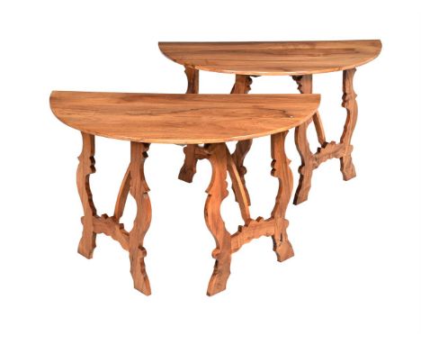 A PAIR OF HARDWOOD SIDE OR CONSOLE TABLES SECOND HALF 20TH CENTURYEach of demi-lune outline, and forming a circular table, on
