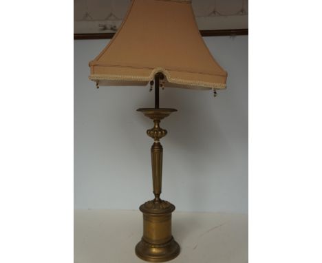 Large brass based table lamp