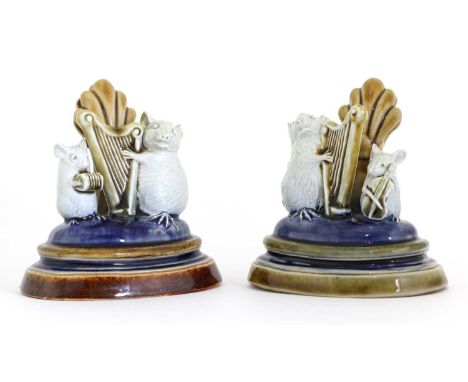 Two Doulton stoneware 'Mouse Musician' menu holders, both dated 1885, by George Tinworth, one modelled as two mice playing a 