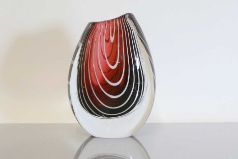 A Swedish Kosta 'Zebra' glass vase,1950s, designed by Vicke Lindstrand, the red sommerso decoration with white banding, incis