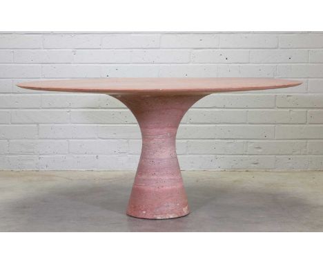 A Travertine Rosso marble 'Angelo M' table,modern, designed by Leo Aerts for Alinea, with a circular top, raised on a taperin