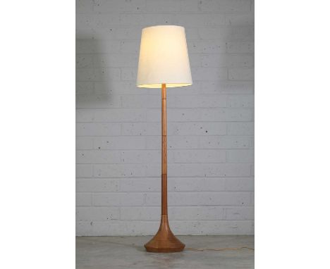 A Danish oak floor lamp, 1960s, with a turned column and cream shade,158cm highCondition ReportWorking condition. Some knocks