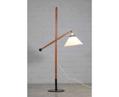 A pine 'Le Klint' Model 325 floor lamp,1950s, designed by Vilhelm Wohlert, with an adjustable central arm with a brass mount,