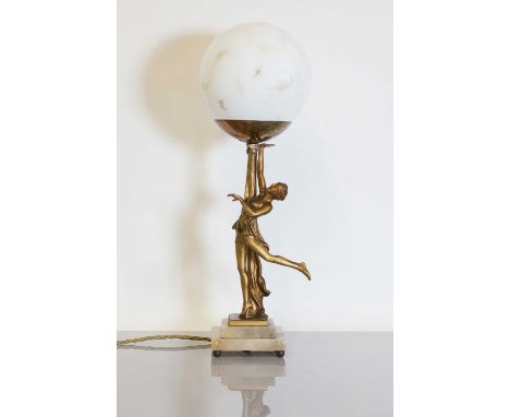 An Austrian Art Deco gilt-pewter table lamp,c.1930, by Josef Lorenzl, modelled as a dancer holding aloft a spherical shade, r