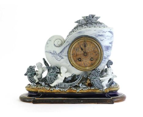 A rare Doulton Lambeth 'Nautical' clock, dated 1878, by George Tinworth and decorated by Hannah Barlow, the case modelled as 