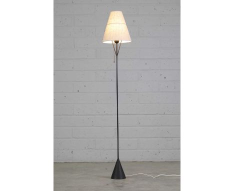 A Danish 'Visa Versa' floor lamp,by Illums Bolighus, with a black patinated column, raised on a tapered plinth, labelled '708