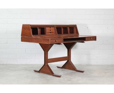 An Italian walnut 'No. 530' desk, designed by Giancarlo Frattini for Bernini, with a sloped superstructure fitted with two ta