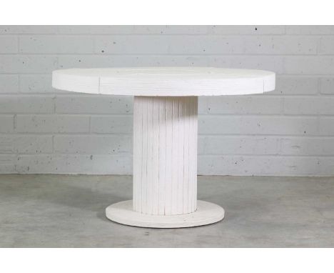 A contemporary ceramic mounted centre table,the circular top mounted with four quartered segments, centred with a circular pa