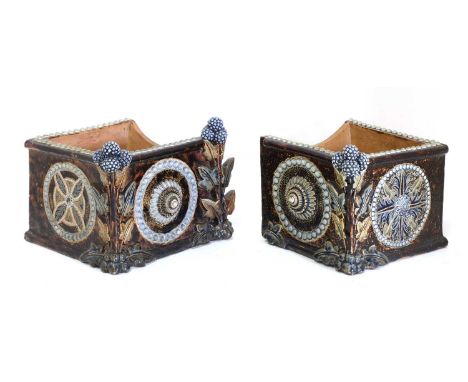 A Doulton Lambeth stoneware two-part trough,1877, possibly by Eleanor Burrell, modelled with roundel-mounted panels, with the