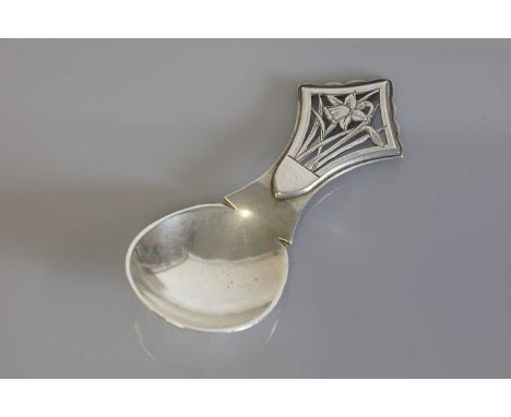 An Arts &amp; Crafts silver caddy spoon,Henry George Murphy, London 1937,with Eagle Studios mark, the handle with pierced and