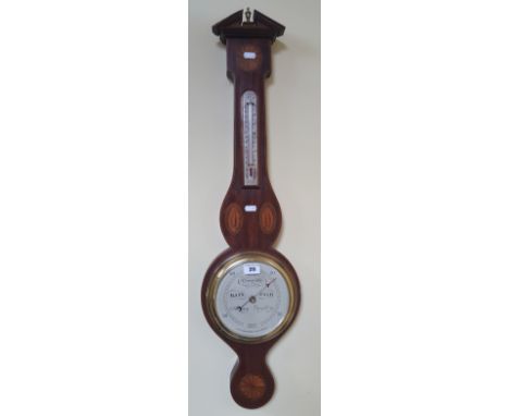 A Banjo Barometer by Short and Mason, London with shell shaped decoration, 20th Century.