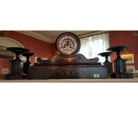A Victorian Black Slate Mantel Clock Garniture.