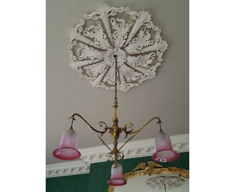 A Very Good 19th Century Three Branch Brass Ceiling Light, fitted with clear to cranberry glass shades.