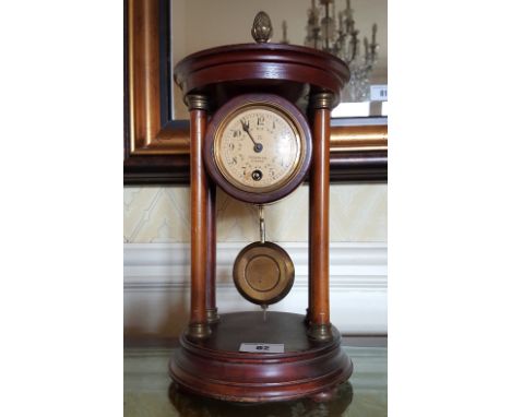 A German Mahogany Portico Mantel Clock, 20th Century.