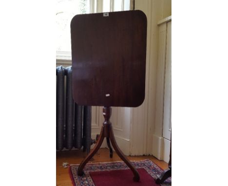 A Neat Rectangular Mahogany Tilt-Top Table on tripod base.
