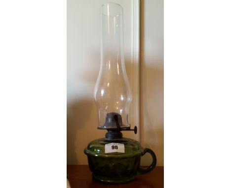 An Early 20th Century Green Glass Thumb Lamp.