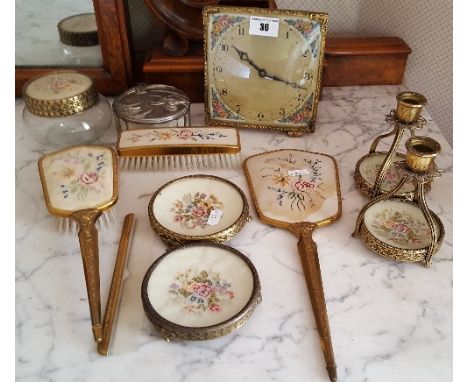 A Mid 20th Century Eleven-Piece Dressing Table Set, to include brushes, mirrors, a candle holders, a clock etc.