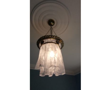 A Decorative Brass Ceiling Light Shade with Curtain.