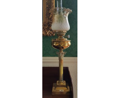 A Superb Quality Juno Early 20th Century Brass Oil Lamp of Neo Classical Form; with glass flue and frosted and acid etched gl