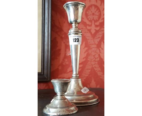 A Silver Hallmarked Candlestick together with a smaller silver hallmarked candlestick. 449g (2).