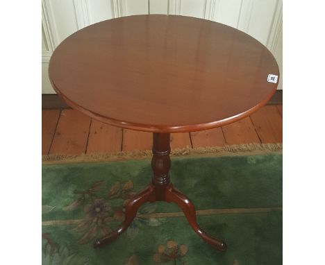 A 19th Century Mahogany Tripod Wine Table, diameter 22ins, height 27.5ins.