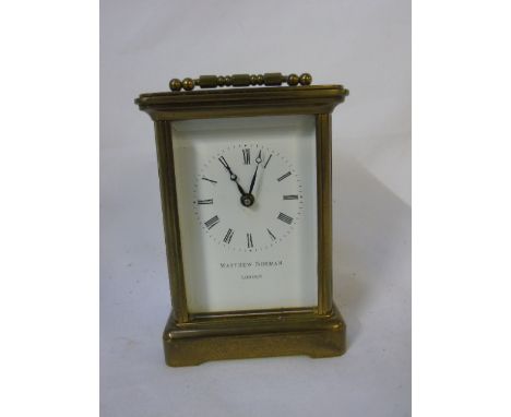 Vintage brass carriage clock by Matthew Norman of London