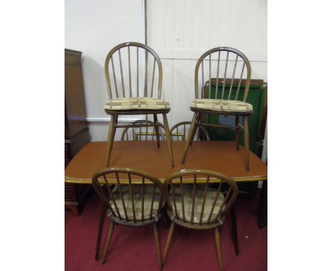 Ercol dark wood dinin table and 6 hoop back chairs