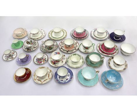 A collection of seven Aynsley porcelain trios and a collection of seventeen Aynsley cups and saucers, one with matching sugar