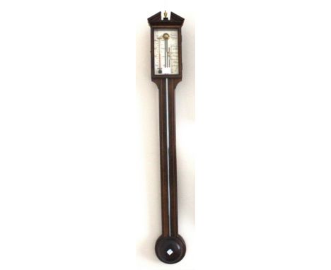 Comitti London:  A reproduction George III style mahogany boxwood strung stick barometer, with silvered dial and turned ciste