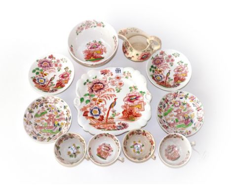 A Hilditch & Son part tea service, printed and coloured with The Peacock pattern, seven pieces, three cups and saucers in the