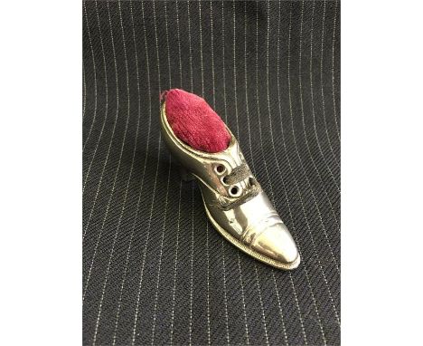 Vintage shoe pin cushion with lace.