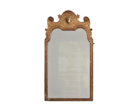 A GEORGE I CARVED GILTWOOD AND GESSO WALL MIRRORATTRIBUTED TO JOHN BELCHIER, CIRCA 1720110cm high, 60cm wideCondition Report: