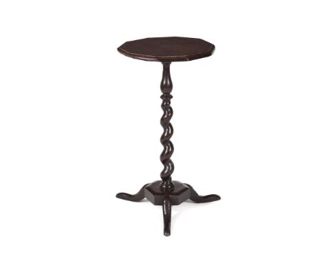 A WILLIAM & MARY OAK PEDESTAL TABLECIRCA 1690The dodecahedral top above a barley twist stem68cm high, the top 37.5cm diameter