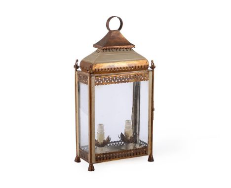 A REGENCY TÔLE WARE AND PARCEL GILT LANTERN CIRCA 1815 Of mantel clock form48.5cm high, 24cm wideFor a similar but plainer ex