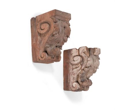 A PAIR OF CARVED PINE ARCHITECTURAL CORBELS ENGLISH, 17TH CENTURY Of scrolling acanthus form within volute endseach 31cm high