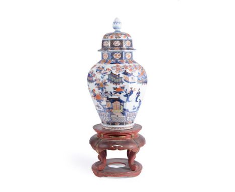 A JAPANESE ARITA VASE LATE 17TH OR 18TH CENTURY The vase of octagonal form, with decoration of pavilions, houses, figures and