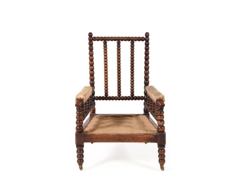 Y A VICTORIAN ROSEWOOD BOBBIN FRAMED ARMCHAIRPOSSIBLY AMERICAN, LATE 19TH CENTURY100cm high, 68cm wide, 60cm deep overallCond