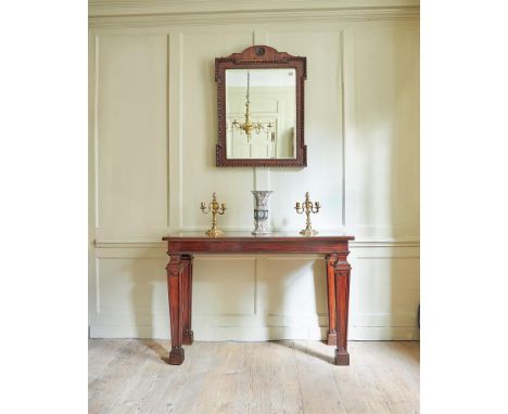 A GEORGE III MAHOGANY CONSOLE OR SERVING TABLECIRCA 1760-80With architectural moulded legs92cm high, 133cm wide, 51cm deepCon