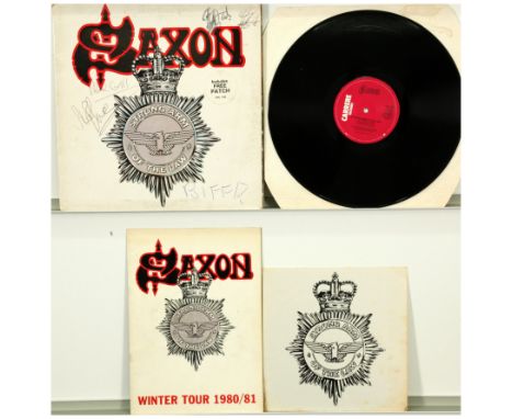 A collection of Saxon - Strong Arm Of The Law SIGNED LP And Tour Programme. Gatefold sleeve limited edition with iron-on patc